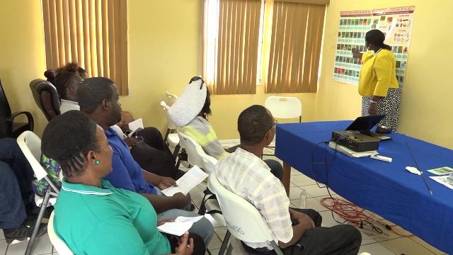 Quarantine Officers at the Department of Agriculture in Nevis at a one-day Surveillance Workshop at the Department of Agriculture’s conference room at Prospect on August 14, 2018, listen keenly to Ms. Jeanelle Kelly, Senior Quarantine Officer in the Department of Agriculture in St. Kitts