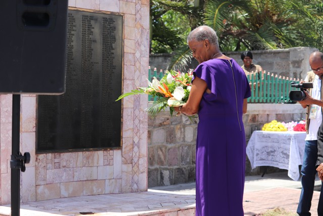 Her Honour Marjorie Morton, Acting Deputy Governor General laying a wreath at the Christena Memorial on Samuel Hunkins Drive at a Memorial Service hosted by the Nevis Island Administration on August 01, 2018, commemorating the 48th anniversary of the Christena Disaster
