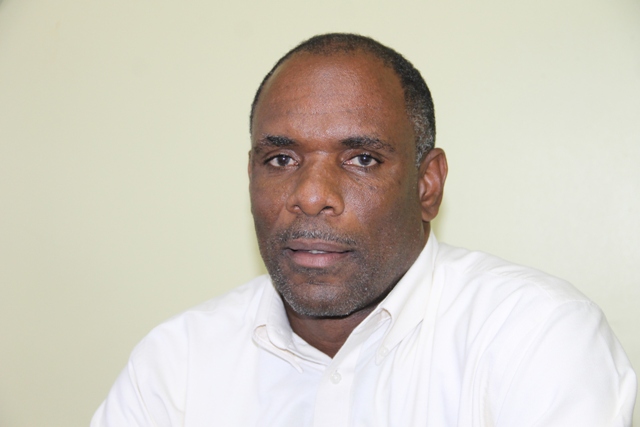 Mr. Colin Dore, Permanent Secretary in the Ministry of Finance in the Nevis Island Administration