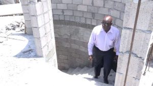 Hon. Alexis Jeffers, Deputy Premier of Nevis and Area Representative for the St. James Parish on the stairway from the ground floor to during his visit at the construction site of the new Newcastle Police Station on August 22, 2018