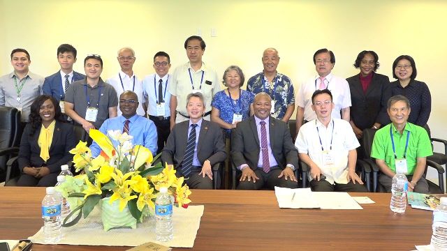 His Excellency Tom Lee, Ambassador of the Republic of China (Taiwan) to St. Kitts and Nevis (front row third from left) and members of a trade delegation from the Republic of China (Taiwan) meeting with Hon. Spencer Brand, Acting Premier of Nevis, (front row third from right) and other senior members of the Nevis Island Administration – (front row l-r) Ms. Kimone Moving, Director of Nevis Investment Promotion Agency; Dr. Ernie Stapleton, Permanent Secretary in the Ministry of Public Works, Physical Planning, Posts and the Environment; and (back row second from right) Mrs. Joan Browne, Principal Assistant Secretary in the Ministry of Finance, at the Nevis Island Administration’s Cabinet room on October 30, 2018, during a one-day visit to Nevis