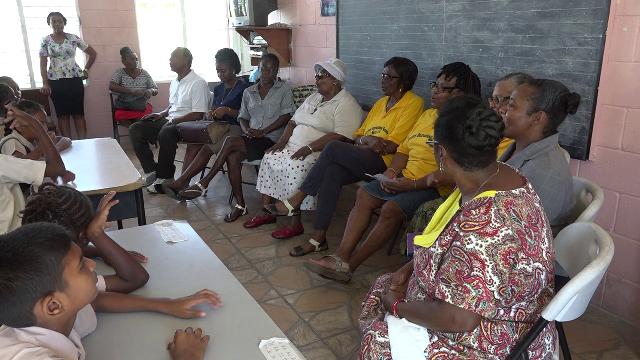 Seniors at the Charlestown Primary School with staff of the Seniors Division in the Ministry of Social Development, taking part in the Intergenerational Exchange with students on October 23, 2018