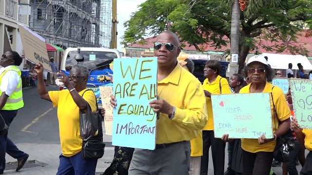 Hon. Eric Evelyn, Minister responsible for seniors on Nevis, joins in the annual Seniors March in Charlestown on October 05, 2018 hosted by the Seniors Division at the Department of Social Services in the Ministry of Social Development in the Nevis Island Administration