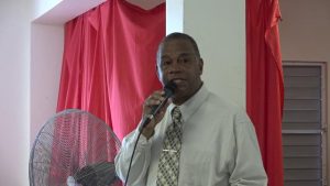 Hon. Eric Evelyn, Minister responsible for seniors and youth of Nevis, delivering remarks at the Intergenerational Exchange at the Charlestown Primary School on October 23, 2018, an activity hosted by the Ministry of Social Development through the Seniors Division as part of the month-long celebration of the elders on Nevis  