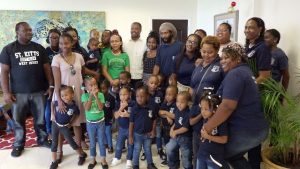 Hon. Mark Brantley, Premier of Nevis with students of the Antioch Baptist Academy Pre-School in St. Kitts, their parents and teachers while visiting his office spreading Christmas cheer on November 30, 2018