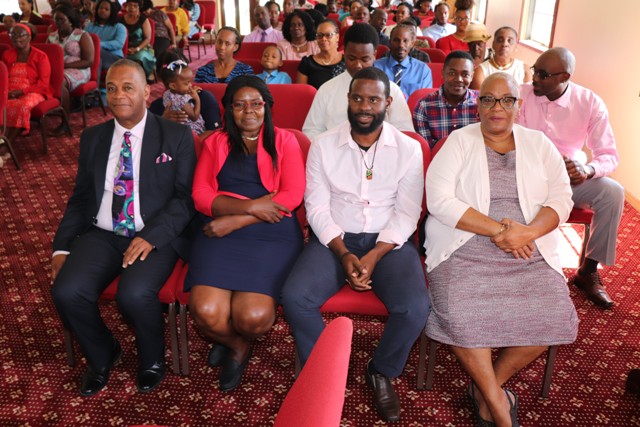 Hon. Eric Evelyn, Minister of Information (extreme left); Ms. Judith Dasent, Acting Director at the Department of Information and staff worshipping at the New Testament Church of God at Bath Village on January 27, 2019 at the start of the department’s awareness week of activities