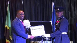 Hon. Mark Brantley, Premier of Nevis presents third runner up No. 735 Constable Lowell Wallace of the Task Force Unit with gifts at the Royal St. Christopher and Nevis Police Force (Nevis Division) Constable’s Awards Ceremony and Dinner, hosted by the Strategic Planning Group on February 23, 2019, at the Occasions Entertainment Arcade at Pinney’s Estate