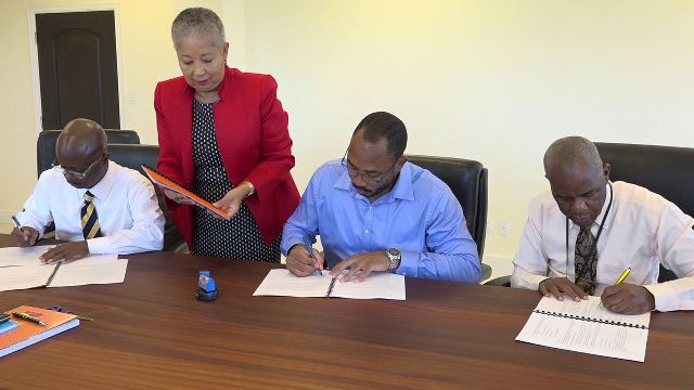 (L-r) Mr. Wakely Daniel Permanent Secretary in the Premier’s Ministry, Mrs. Hélène Anne Lewis, Legal Advisor to the NIA; Mr. Jonel Powell, Managing Director and Legal Counsel of B&L Worldwide Ltd.; and Mr. Oral Brandy, Manager of the Nevis Air and Sea Port Authority signing the Concession Agreement Regarding the Development of Vance W. Amory International Airport, by and between the Nevis Island Administration, Nevis Air and Sea Port Authority and B&L Worldwide Ltd. On February 06, 2019 in Cabinet Room at Pinney’s Estate