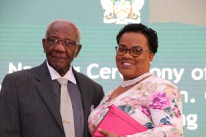 Photo caption: Mr. Theodore Hobson Q.C and Mrs. Charmaine Hanley, his personal secretary of 32 years at the naming ceremony of the courthouse in Charlestown on April 28, 2019