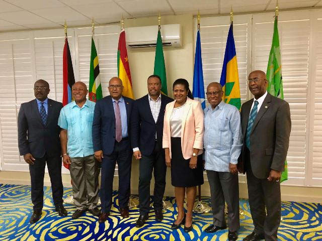 Hon. Mark Brantley, St. Kitts and Nevis Minister of Foreign Affairs and Aviation (fourth from left) with counterparts from the region for the Fifth Meeting of the Organisation of Eastern Caribbean States Council of Foreign Affairs, and the Twenty-Second Meeting of the Council of Foreign and Community Relations from May 12 to 14 at the Radisson Resort in Grand Anse, Grenada