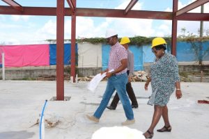 Hon. Hazel Brandy-Williams, Junior Minister of Health on Nevis walks through ongoing work for the Alexandra Hospital Expansion Project on Thursday, May 23, 2019, flanked by Mr. Billy Claxton, Project Manager, and Mr. Gary Pemberton, Hospital Administrator 