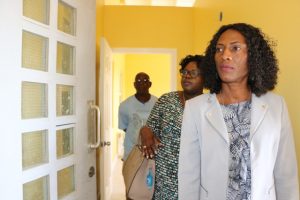 Hon. Hazel Brandy-Williams, accompanied by Ms. Shelisa Martin-Clarke, Acting Permanent Secretary in the Ministry of Health, and Mr. Egbert Clarke, contractor, touring the kitchen expansion project at the Flamboyant Nursing Home on Thursday, May 23, 2019