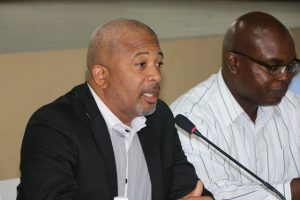 Hon. Spencer Brand, Minister of Communication and Works on Nevis and Dr. Ernie Stapleton, Permanent Secretary in the Ministry of Communications and Works, at a town hall meeting at the Cotton Ground Community Centre hosted by the Ministry of Communications and Works on May 30, 2019 addressing residents on Phase 1 of the Island Main Road Rehabilitation and Safety Improvement Project