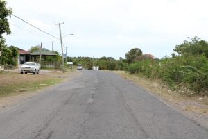 A section of the road to be rehabilitated in Phase 1 of the Island Main Road Rehabilitation and Safety Improvement Project from Cotton Ground to Cliff Dwellers 