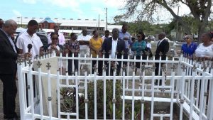 Hon Alexis Jeffers, Deputy Premier of Nevis singing a hymn at a Memorial Service for Hon. Malcolm Guishard of blessed memory at the Bath Cemetery on June 11, 2019