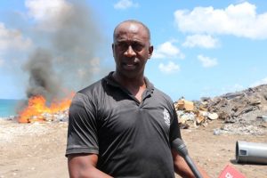 Inspector James Stephen, Head of the Nevis Task Force based at the Charlestown Police Station, speaking to the Department of Information during an exercise at the Nevis Solid Waste Management Authority landfill at Long Point on June 13, 2019  