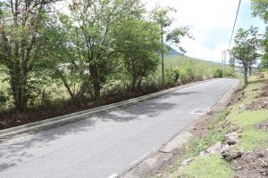 A section of the 80 meters of curb and slipper drain poured at Cliff Dwellers in the Nevis Island Administration’s EC$6.7million Island Main Road Rehabilitation and Safety Improvement Project