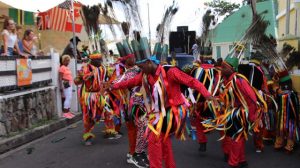 Cotton Ground Masquerade group performing in Culturama 45 Cultural Street Parade in Charlestown on August 06, 2019