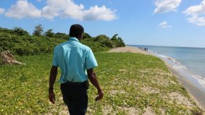 Mr. Lemuel Pemberton, Deputy Director of the Marine Resources Department on Nevis at Cades Bay Beach on August 13, 2019, in the area where a nesting hawksbill was taken by poachers days before