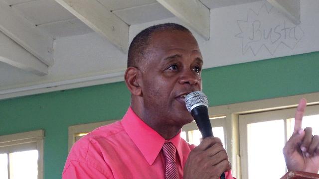 Hon. Eric Evelyn, Minister of Youth and Area representative for the St. George’s Parish, addressing Gingerland Secondary School students during assembly on September 13, 2019
