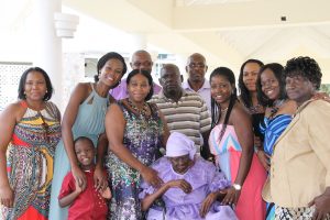 Ms. Celian “Martin” Powell celebrating her 104th birthday surrounded by her family