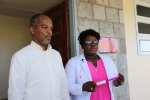 Hon. Hazel Brandy Williams, Junior Minister of Health with Mr. Gary Pemberton, Hospital Administrator showing off one of the new identification wrist bands issued to anyone admitted to the Alexandra Hospital during her visit to the health facility on October 11, 2019