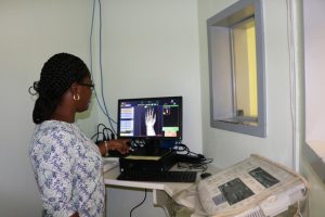 Mrs. Karema David, Radiographer at the Alexandra Hospital points to the newly commissioned Direct Radiography system in the X-Ray Unit at the Alexandra Hospital on October 11, 2019