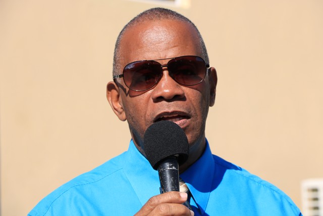 Hon. Eric Evelyn, Minister of Social Development and Culture in the Nevis Island Administration, speaking to the Department of Information at the construction site for a multi-purpose facility at Market Shop in Gingerland during a visit on October 30, 2019