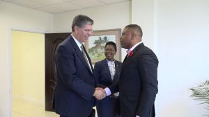 (l-r) Hon. Mark Brantley, Minister of Foreign Affairs and Premier of Nevis, welcomes His Excellency Mr. Massimo Ambrosetti, Italian Ambassador to St. Kitts and Nevis to his office at Pinney’s Estate on November 06, 2019. Ms. Thouvia France, Foreign Service Officer in the Ministry of Foreign Affairs looks on