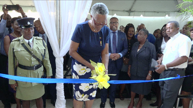 : Her Honour Hyleeta Liburd, Deputy Governor General on Nevis, cuts the ribbon to commission the new building which will house the Nevis Island Administration’s Treasury Department on January 30, 2020