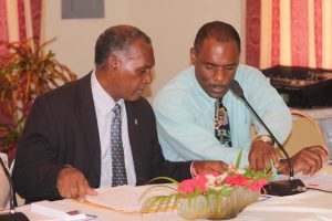 (L-r) Hon. Vance Amory, former Premier of Nevis and Mr. Colin Dore, Permanent Secretary in the Ministry of Finance (file photo)