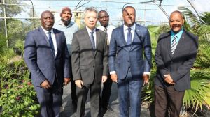 Front row (left to right): Hon. Alexis Jeffers, Deputy Premier and Minister of Agriculture; His Excellency Tom Lee, the Republic of China (Taiwan) Resident Ambassador to St. Kitts and Nevis; Hon. Mark Brantley, Premier of Nevis; Hon. Eric Evelyn, Minister of Social Development, (back row): Mr. Huey Sargeant, Permanent Secretary in the Ministry of Agriculture; and Mr. John Hanley, Permanent Secretary in the Ministry of Tourism during a visit to the nursery at Cades Bay with propagated plants for landscaping at the St. Kitts and Nevis Pinney's Beach Park Project on February 13, 2020