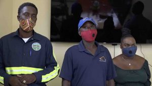 l-r) Mr. Kester Webbe Field Supervisor at the Public Works Department; Mr. Duncan Mills, a heavy equipment operator on Nevis; and Ms. Natasha Jeffers, a young mother