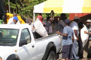 Some of the 154 farmers receiving free animal feed at Prospect on July 15, 2020, as part of a Nevis Island Administration/Eastern Caribbean Group of Companies partnership