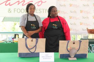 Chef and Culinary artist Erika Stapleton and her assistant Joyelle Phillip at the Cook-Off at the Nevis Mango and Food Festival, hosted by the Nevis Tourism Authority at Cleveland Gardens on July 04, 2020