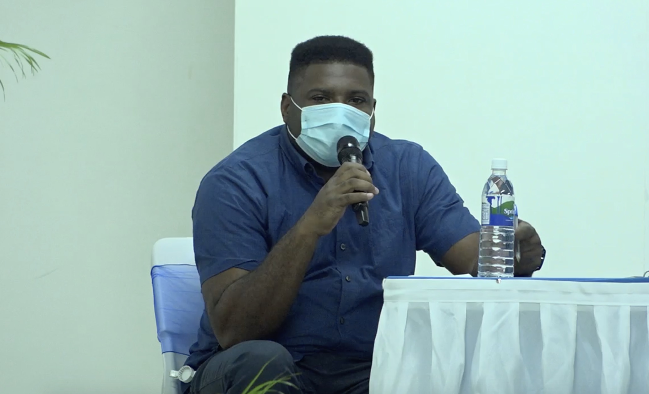 Hon. Troy Liburd, Junior Minister of Education in the Nevis Island Administration (NIA), making a presentation during an NIA town hall meeting at the Cotton Ground Community Centre, on July 23, 2020