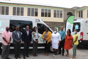 Mr. Vernel Powell, Deputy Director of Social Security; Mr. Antonio Maynard, Director of the St. Christopher and Nevis Social Security Board; Hon. Mark Brantley Premier of Nevis and Minister of Health in the Nevis Island Administration; Ms. Shelisa Martin-Clarke, Permanent Secretary, in the Ministry of Health; Hon. Hazel Brandy-Williams, Junior Minister of Health on Nevis; Assistant Matron at the Alexandra Hospital Jessica Scarborough; Mr. Gary Pemberton, Hospital Administrator at the Alexandra Hospital; Ms. Jenifer Williams, Social Security Board member; and Dr. Florelle Hobson, Acting Medical Chief of Staff at the Alexandra Hospital at a ceremony commissioning two new ambulances at the Alexandra Hospital on August 28, 2020