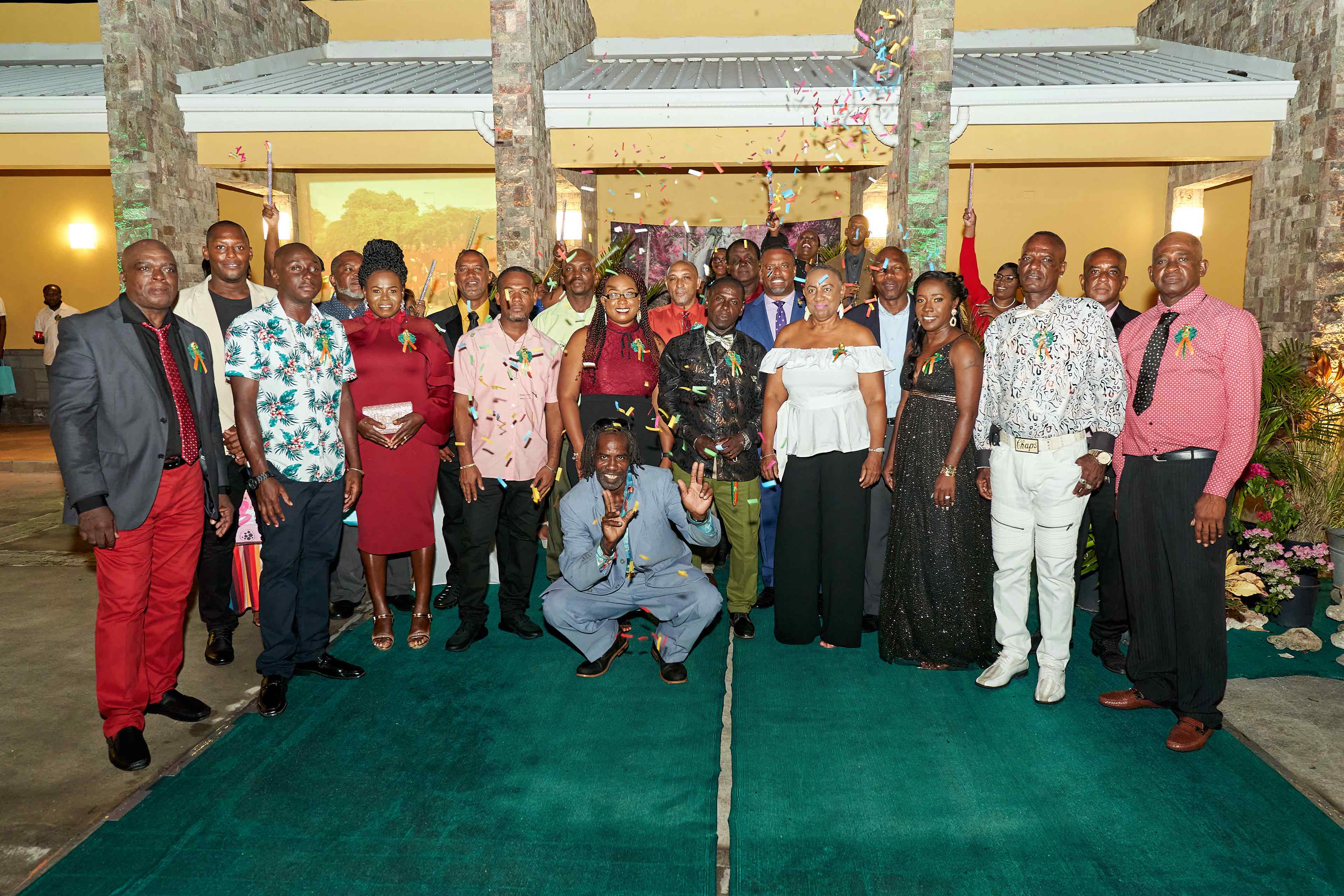 Hon. Mark Brantley, Premier of Nevis and Minister of Public Utilities (second row third from right) with the 25 past and present employees at the Nevis Electricity Company Limited honoured for 20 years of service during the company’s cocktail and awards ceremony at the Nevis Performing Arts Centre on August 29, 2020, in celebration of the company’s 20th anniversary on September 01, 2020 (Photo courtesy the Nevis Electricity Company Limited)