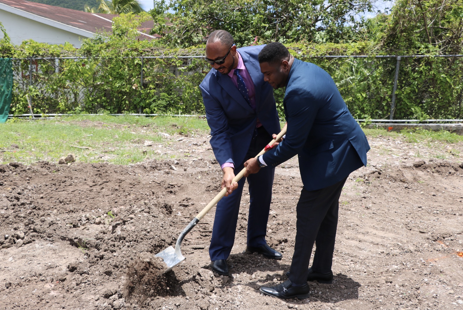 Hon. Jonel Powell, Federal Minister of Education; and Hon. Troy Liburd, Junior Minister of Education in the Nevis Island Administration, turn the sod to signal the start of construction of a state-of-the-art multipurpose technical wing at the Gingerland Secondary School on August 06, 2020, as part of an US$8million St. Kitts and Nevis Technical Vocational Education and Training (TVET) Enhancement Project