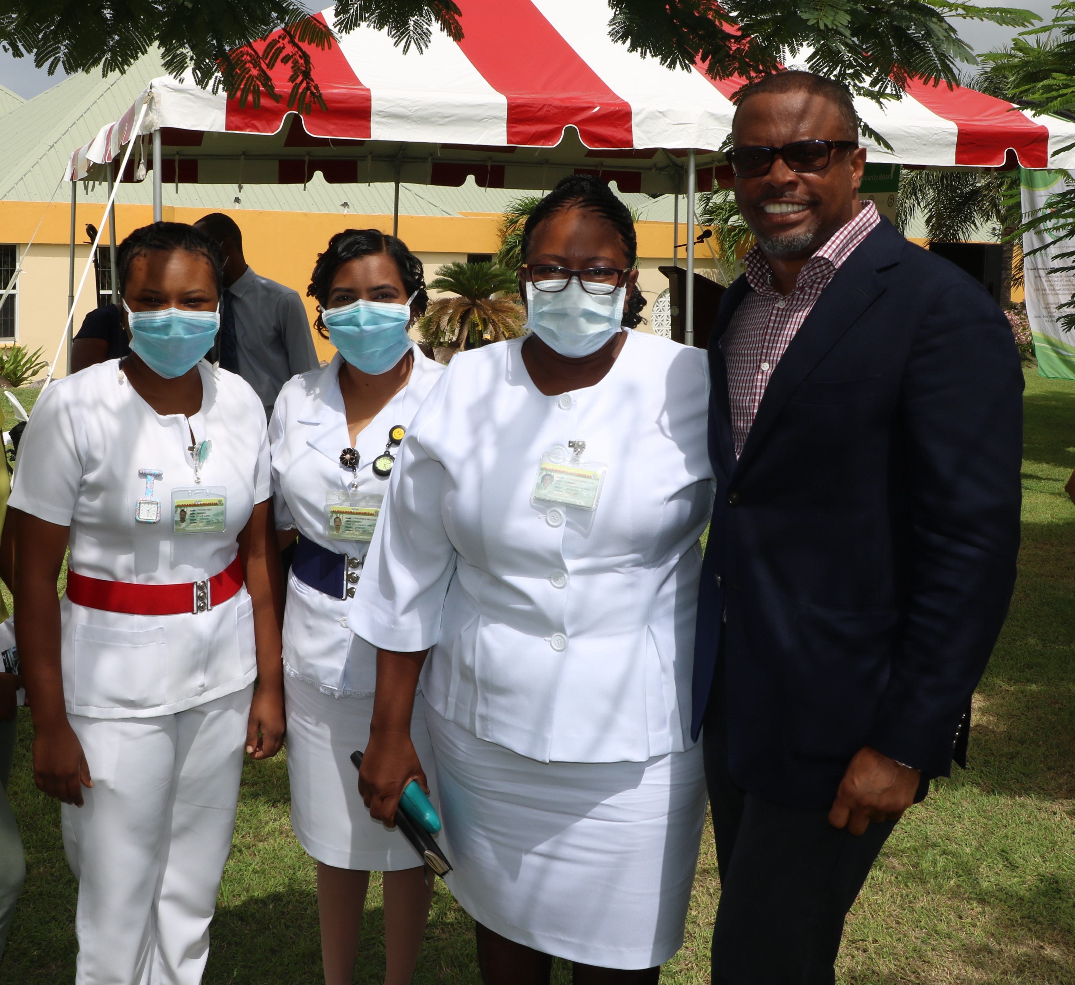 Hon. Mark Brantley, Premier of Nevis and Minister of Finance in the Nevis Island Administration (far right) with nurses at the Alexandra Hospital in Charlestown (file photo)