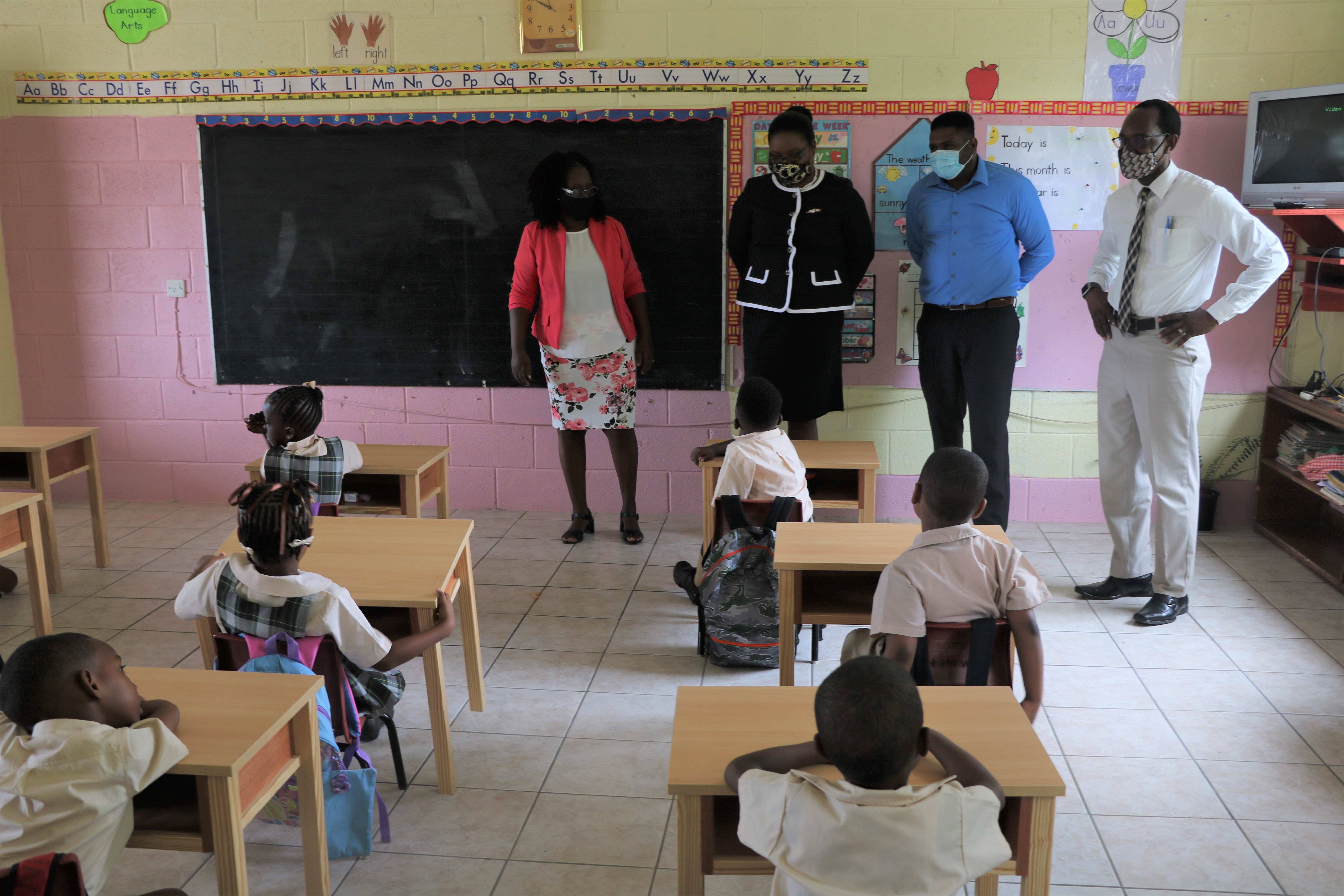 (l-r) Mrs. Cheryl Haynes, Principal of the Charlestown Primary School; Ms. Zahnela Claxton, Principal Education Officer in the Department of Education; Hon. Troy Liburd, Junior Minister of Education in the Nevis Island Administration; and Mr. Kevin Barrett, Permanent Secretary in the Ministry of Education during a tour of the Charlestown Primary School on the first day of the 2020/2021 academic school year on September 07, 2020