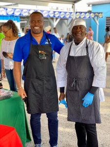 (l-r) Hon. Mark Brantley, Premier of Nevis and Minister of Tourism in the Nevis Island Administration congratulates Hon. Alexis Jeffers, Deputy Premier and Minister of Agriculture, winner of the Taste of Nevis Ministers’ Cook-off at the Cultural Village in Charlestown on October 17, 2020