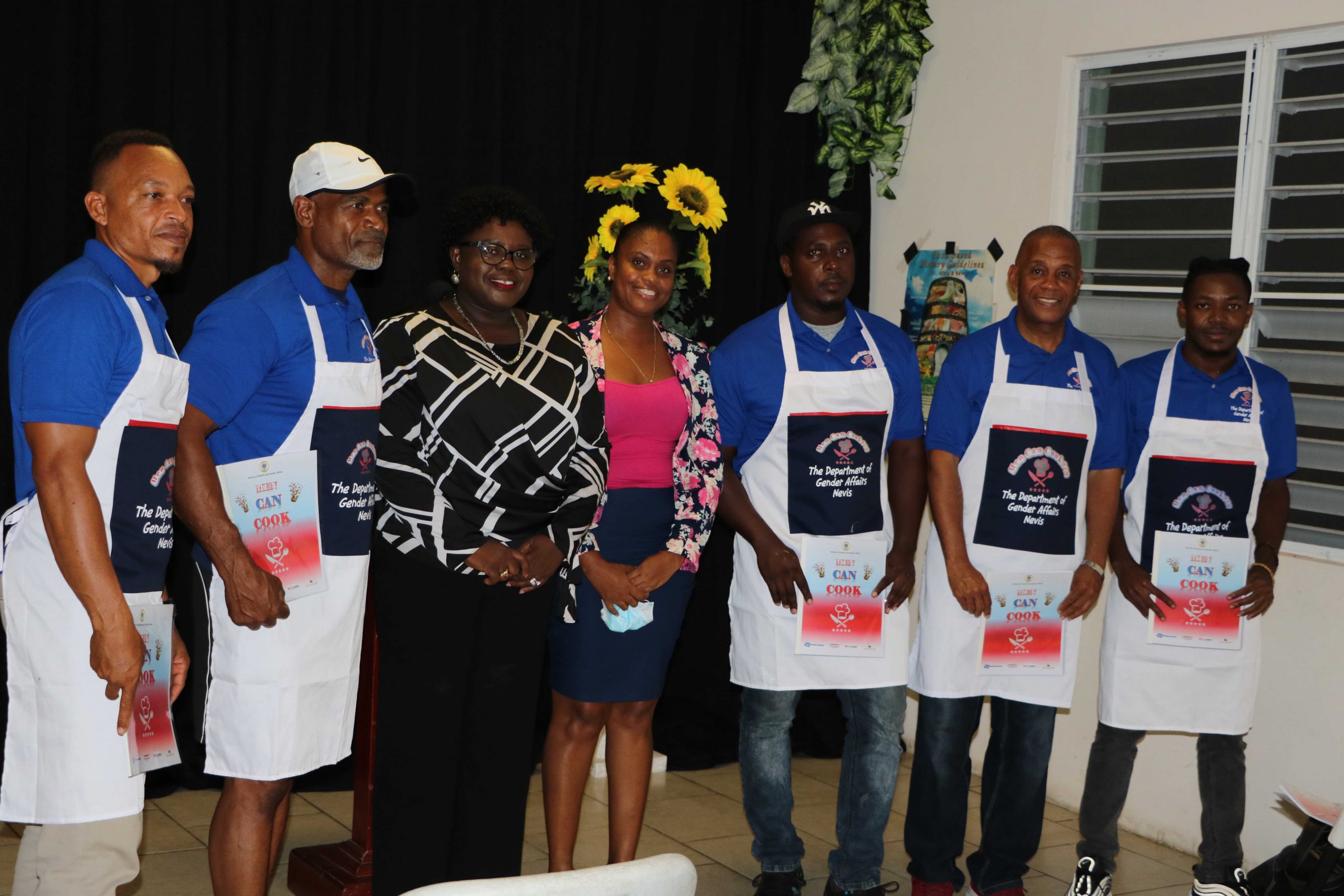 (l-r) Mr. Nedd Lestrade; Mr. David Walwyn; Hon. Hazel Brandy-Williams, Junior Minister of Health and Gender Affairs in the Nevis Island Administration; Ms. Latoya Jeffers, Assistant Permanent Secretary in the Ministry of Health and Gender Affairs; Mr. Kerwin Polius; Hon. Eric Evelyn, Minister of Community Development; and Mr. Chevaun Walwyn at the launch of the “Men Can Cook” programme at the Charlestown Primary School on November 16, 2020