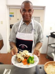Hon. Eric Evelyn, Minister of Community Development in the Nevis Island Administration, displays the meal he prepared during the first session of the “Men Can Cook” programme hosted by the Ministry of Health and Gender Affairs in the Nevis Island Administration at the Charlestown Primary School on November 16, 2020