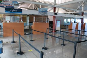 Renovations carried out at the Vance W. Amory International Airport, Nevis in adherence with COVID-19 protocols and requirements, including sneeze guards at all counters and physical distancing markers