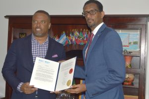 Dr. Yitades Gebre (right), representative of the Pan American Health Organization/World Health Organization to Barbados and Eastern Caribbean when he presented his credentials to the Hon. Mark Brantley, Premier of Nevis and Minister of Foreign Affairs (left) in Basseterre in February 2020 (file photo)