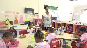 Students from the Gingeland Preschool enjoying the national dish of Belize as part of the “Tour around the Caribbean” initiative introduced in the Department of Education’s School Meals Programme