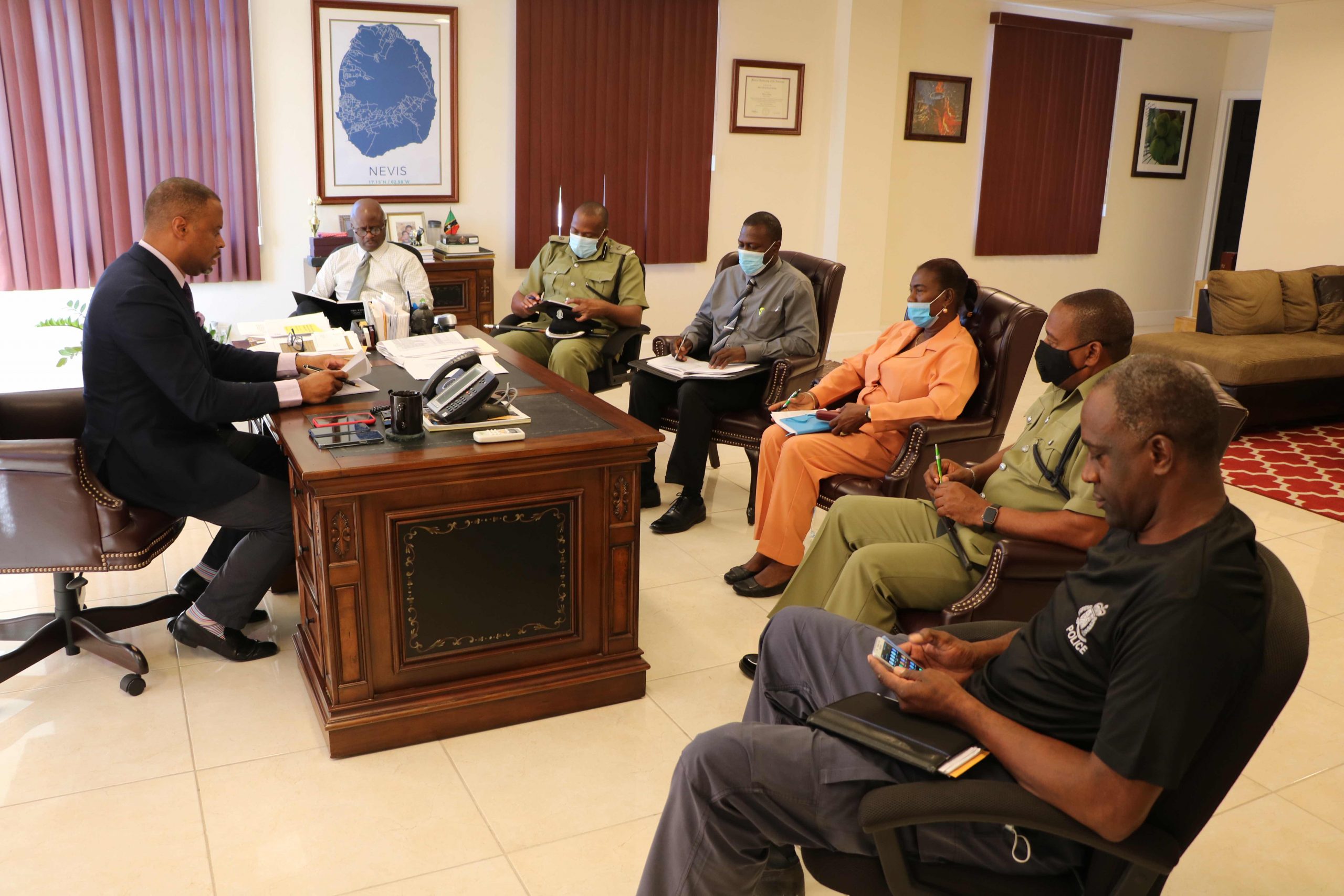 (L-r) Hon. Mark Brantley, Premier of Nevis (at desk); Mr. Wakely Daniel, Permanent Secretary in the Premier’s Ministry; Superintendent Lyndon David, Royal St. Christopher and Nevis Police Force Divisional Commander for District 'C'; Inspector Alonzo Carty; Inspector Urita Collins-Percival; Inspector Reynold Myers; and Inspector James Stephens at a security briefing at the Office of the Premier at Pinney’s Estate on February 02, 2020