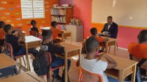 Hon. Mark Brantley, Premier of Nevis and Minister of Education in the Nevis Island Administration reading to Grade six students at the Charlestown Primary School on the occasion of World Read Aloud Day on February 03, 2021 at the Charlestown Primary School