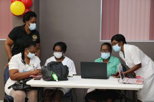 Dr. Judy Nisbett, Chair of the Nevis COVID-19 Task Force guiding health professionals on Nevis at training session at the Disaster Management Department’s conference room on February 19, 2021, in preparation for administering the AstraZeneca-Oxford vaccine in the fight against COVID-19